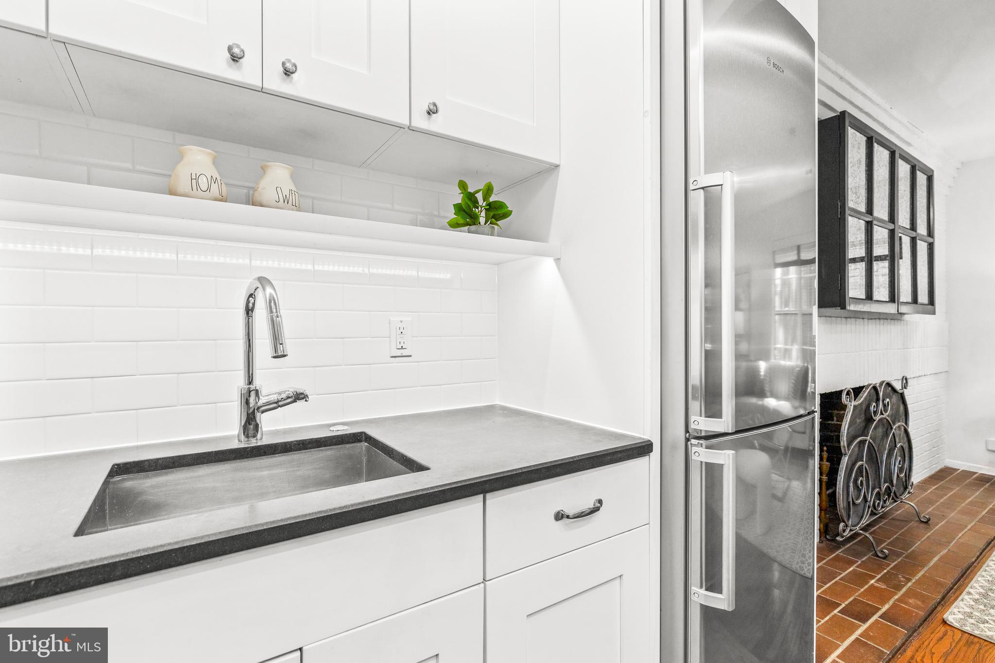 1730 16th Street Northwest, Unit 14 Washington, DC 20009 - Photo 16 of 30 a close view of a sink and counter space
