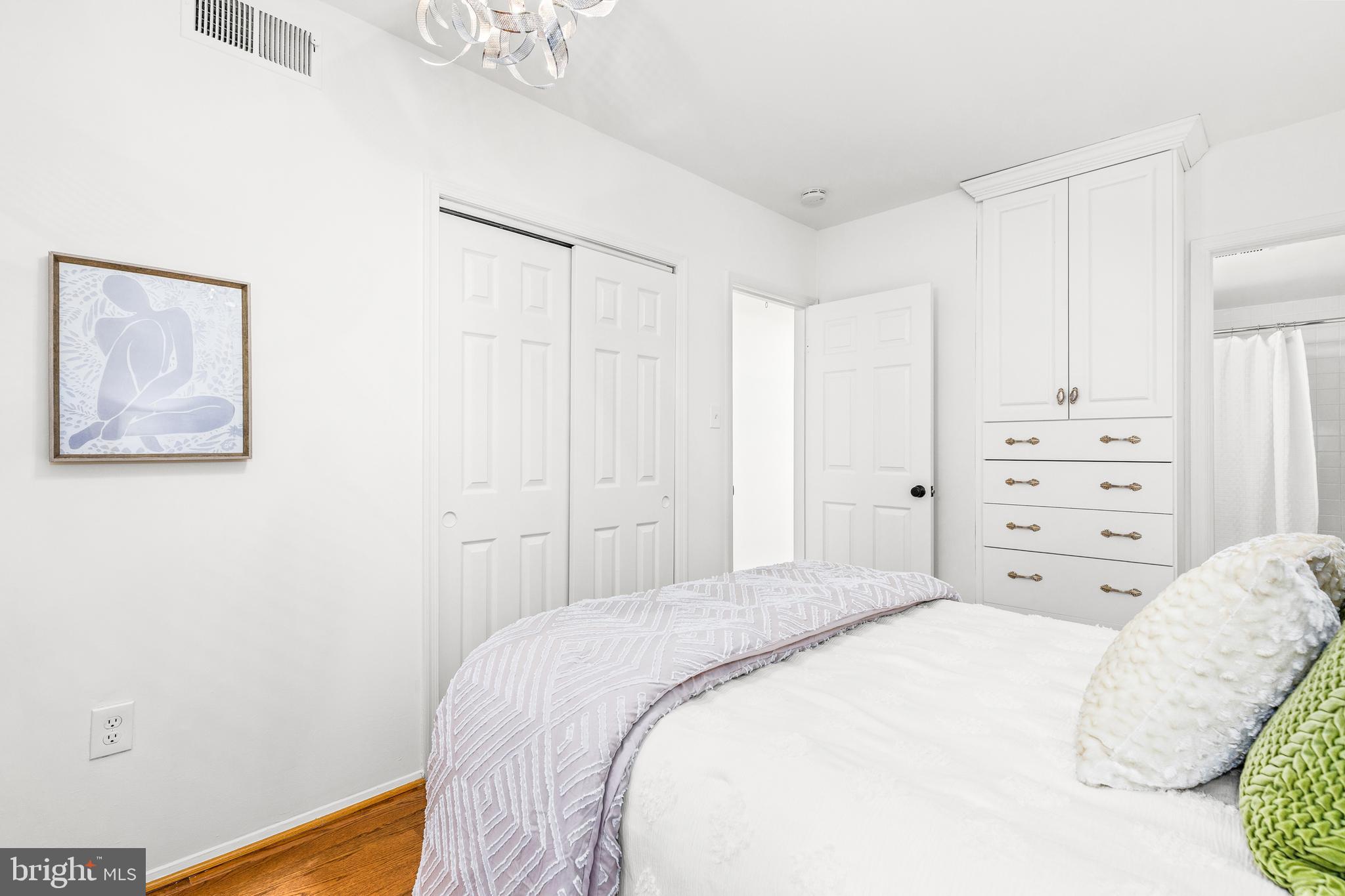 1730 16th Street Northwest, Unit 14 Washington, DC 20009 - Photo 20 of 30 a bedroom with a bed and a window