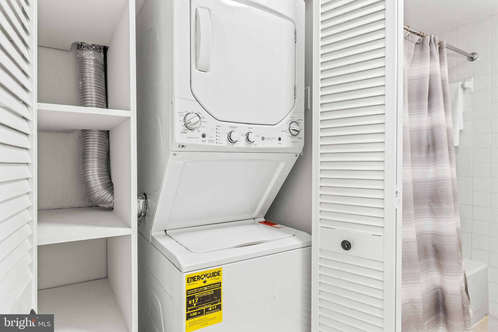 1730 16th Street Northwest, Unit 14 Washington, DC 20009 - Photo 25 of 30 a utility room with dryer and washer