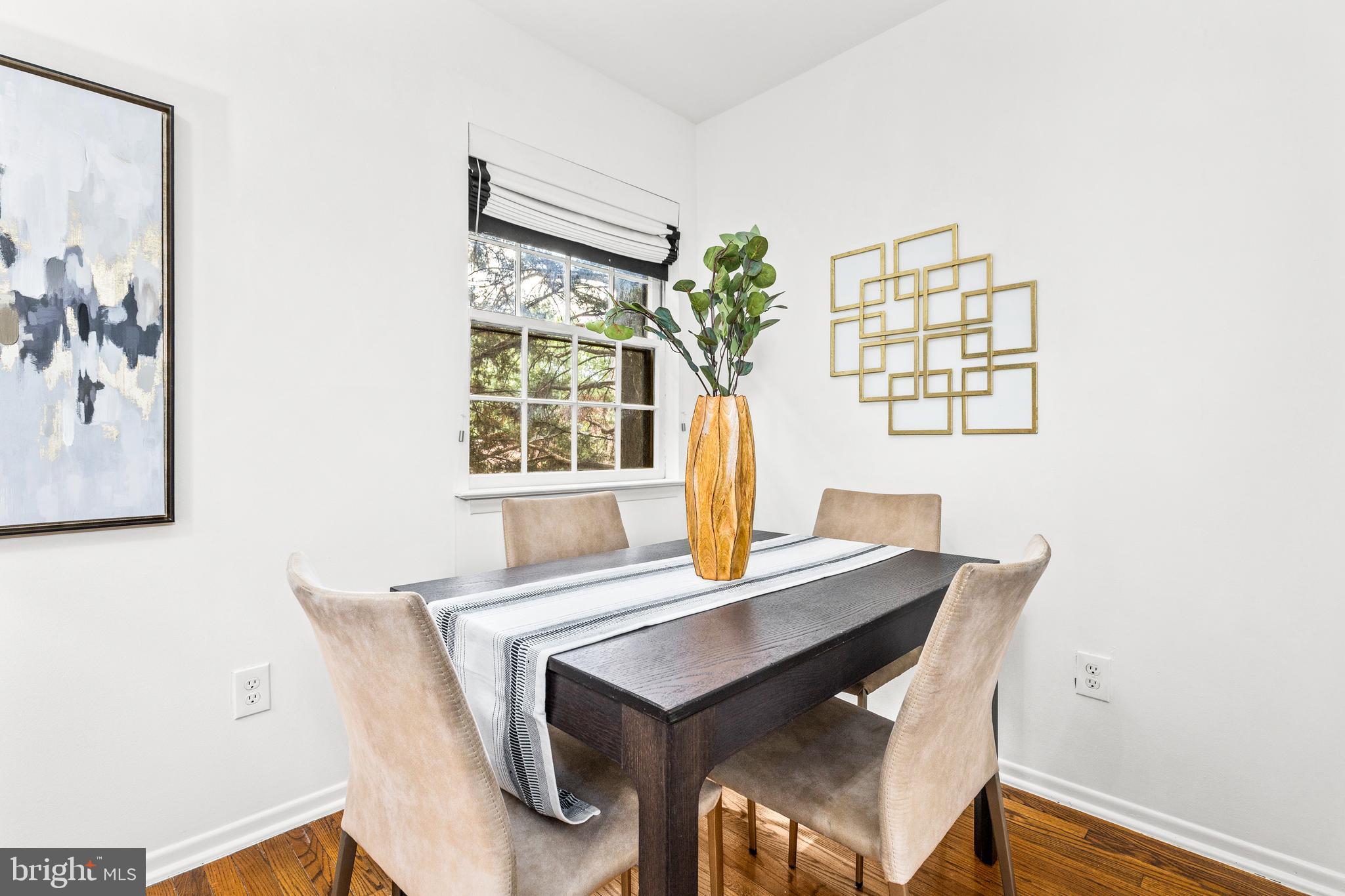 1730 16th Street Northwest, Unit 14 Washington, DC 20009 - Photo 10 of 30 a view of a dining room with furniture and window