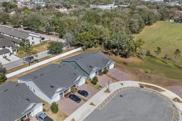 an aerial view of residential house with outdoor space