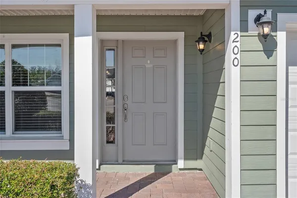 a view of front door and bedroom