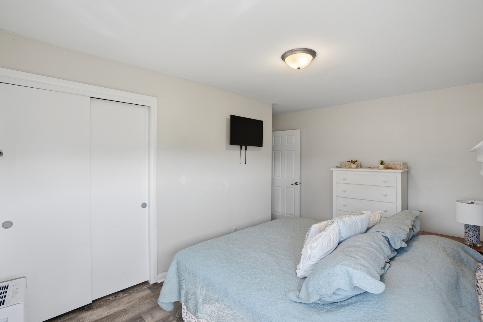 215 North Yates Street Alpha, IL 61413 - Photo 19 of 24 a bedroom with a bed and a flat screen tv