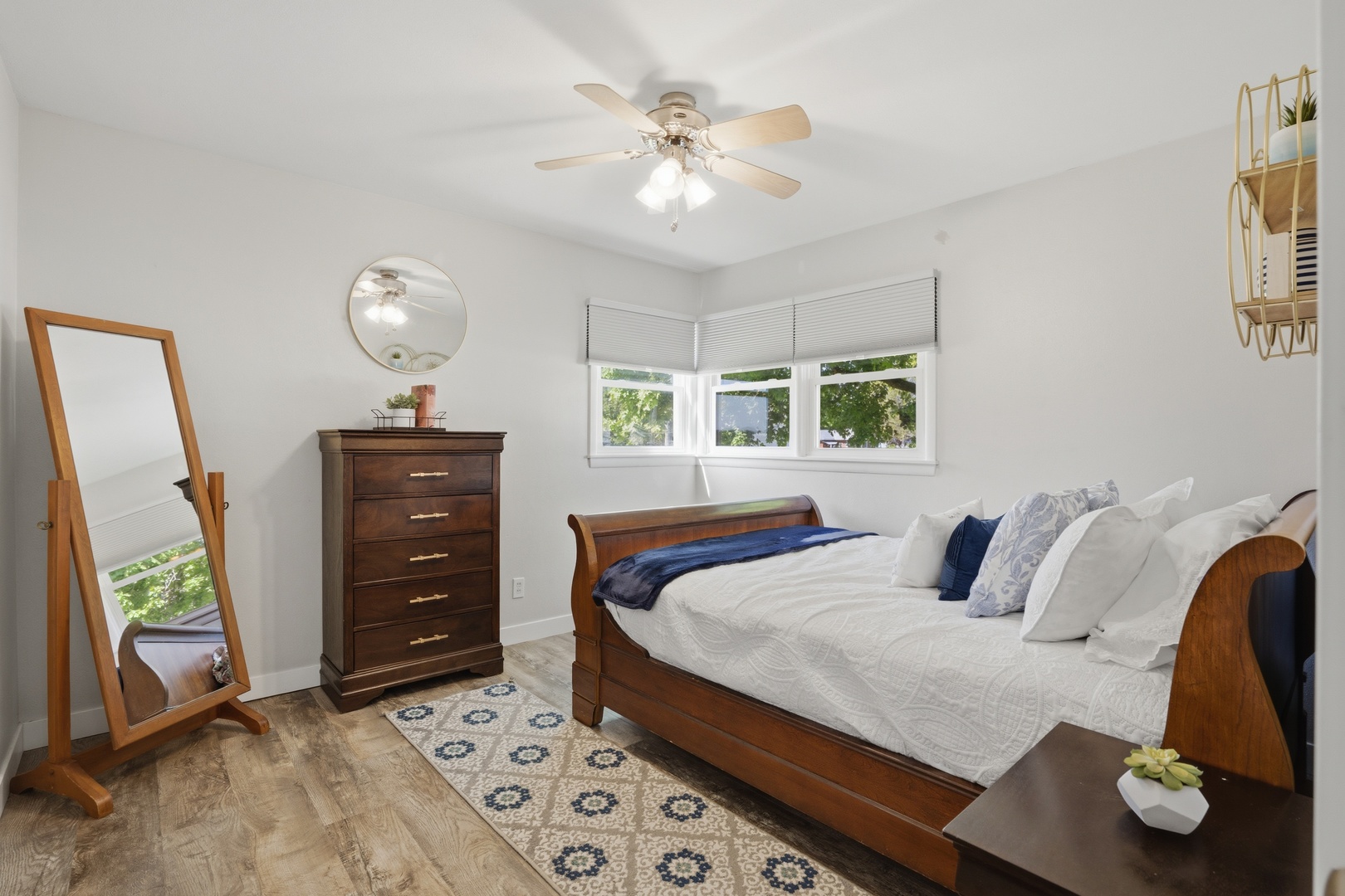 215 North Yates Street Alpha, IL 61413 - Photo 20 of 24 a bedroom with a bed and a chandelier