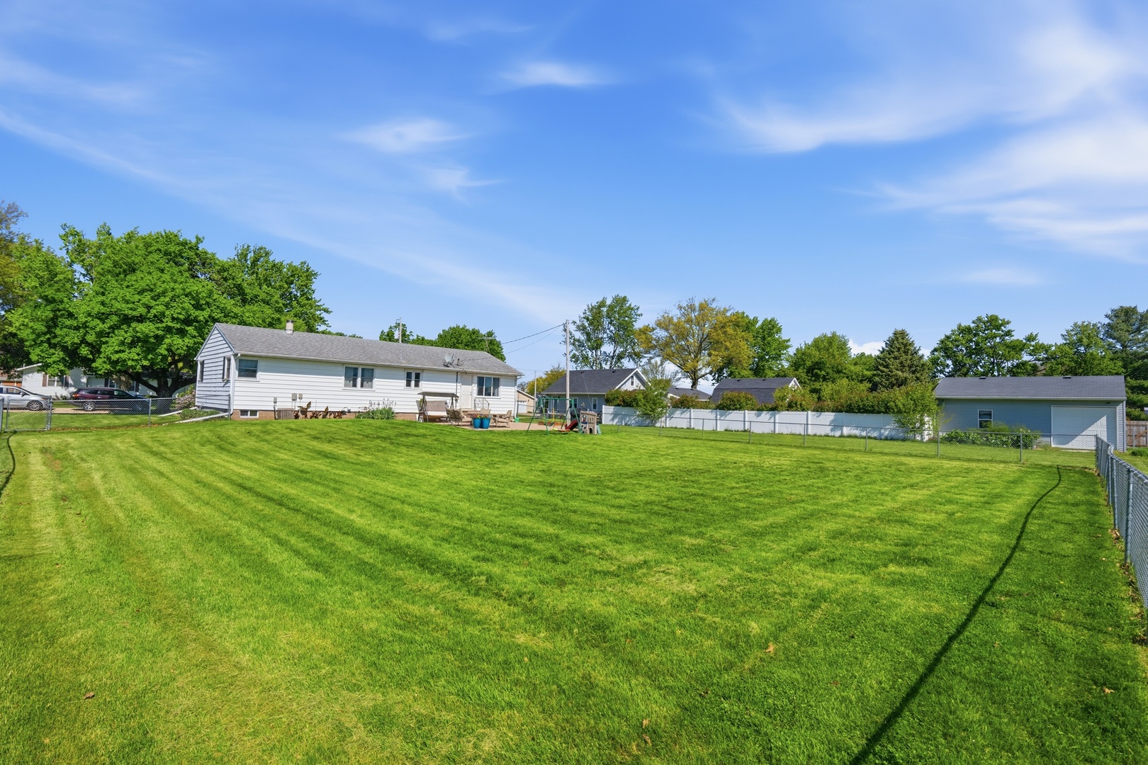 215 North Yates Street Alpha, IL 61413 - Photo 4 of 24 a view of a house with a big yard