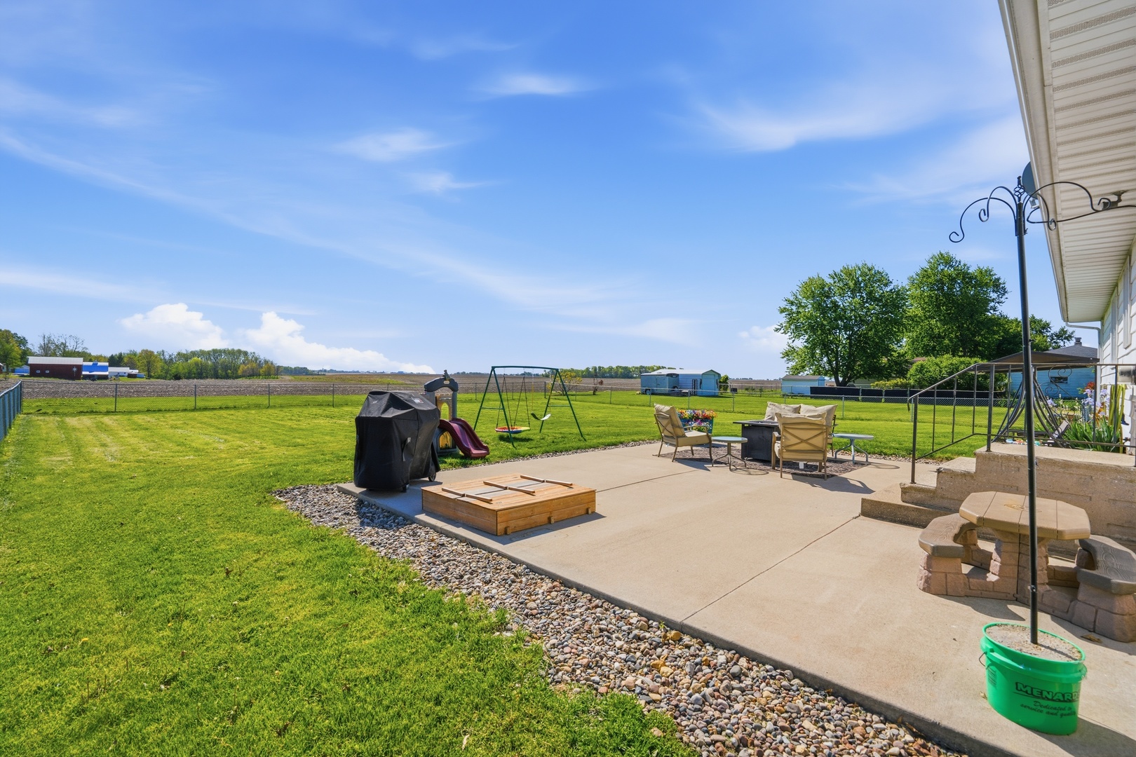 215 North Yates Street Alpha, IL 61413 - Photo 5 of 24 a view of a swimming pool and lounge chairs
