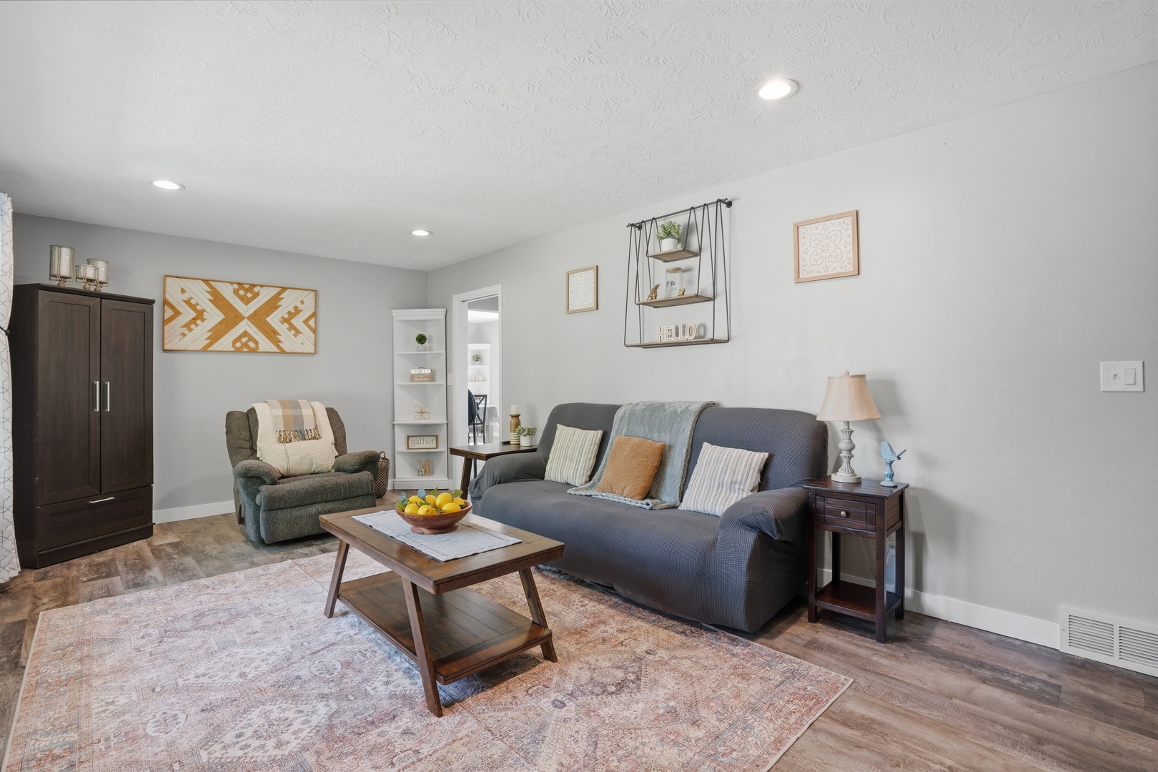 215 North Yates Street Alpha, IL 61413 - Photo 8 of 24 a living room with furniture and a lamp