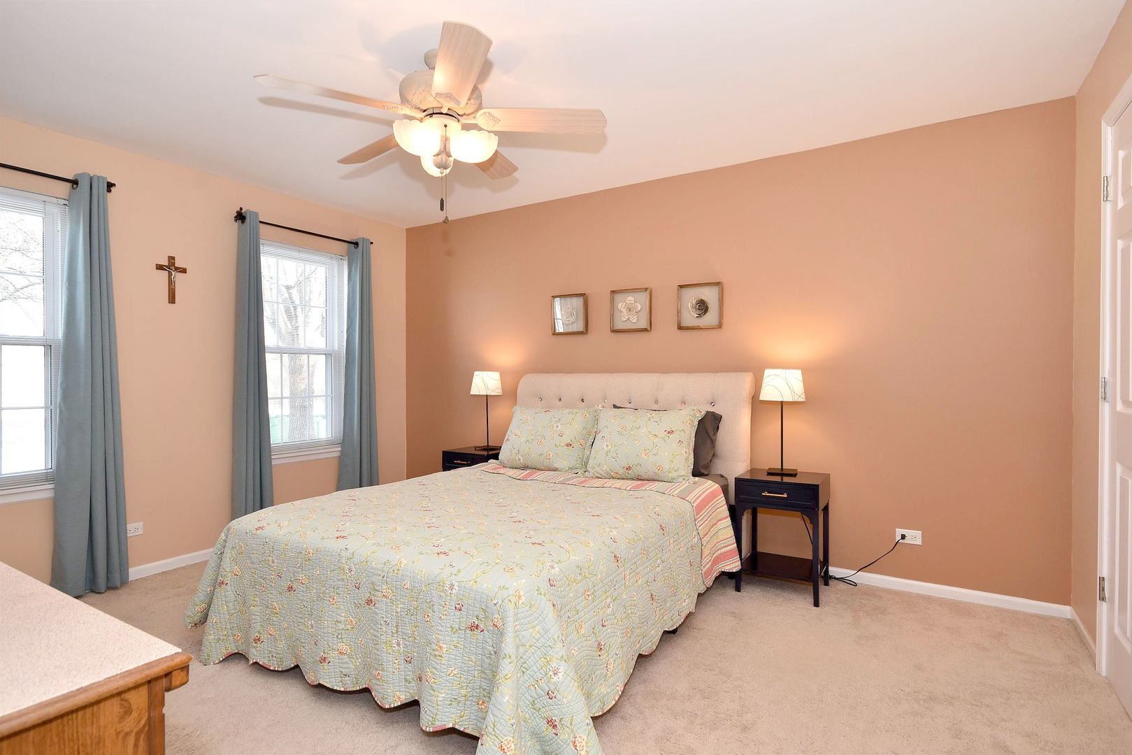 1622 Hadley Court, Unit C1 Wheeling, IL 60090 - Photo 13 of 32 a bedroom with a bed and a chandelier