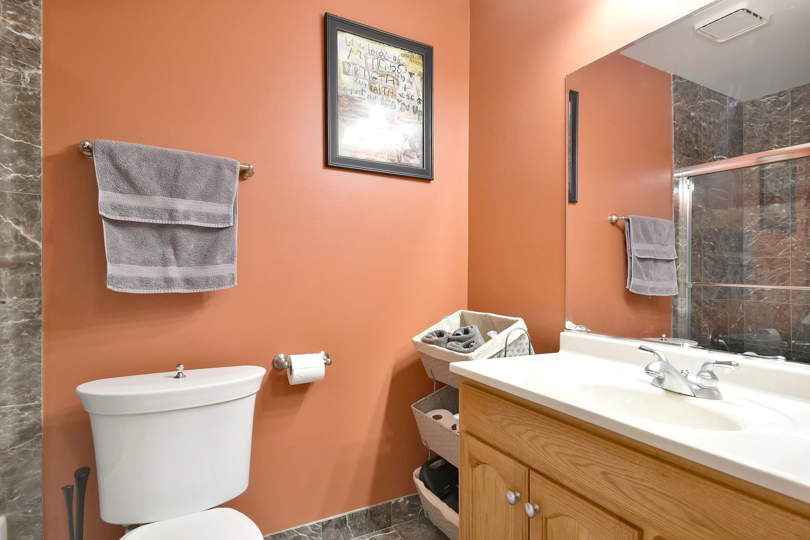 1622 Hadley Court, Unit C1 Wheeling, IL 60090 - Photo 17 of 32 a bathroom with a sink mirror and toilet