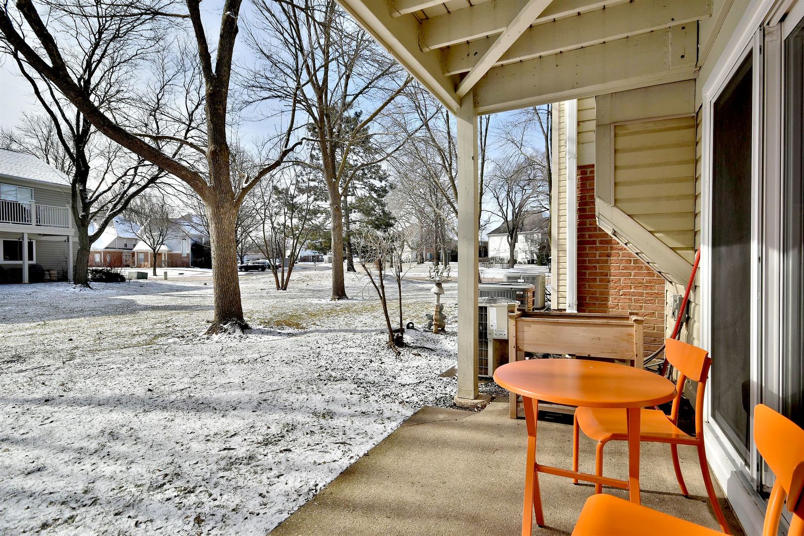 1622 Hadley Court, Unit C1 Wheeling, IL 60090 - Photo 22 of 32 a backyard of a house with outdoor seating
