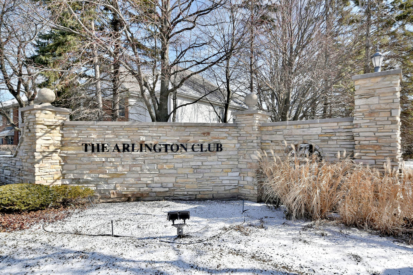 1622 Hadley Court, Unit C1 Wheeling, IL 60090 - Photo 26 of 32 a view of outdoor space with signage and trees