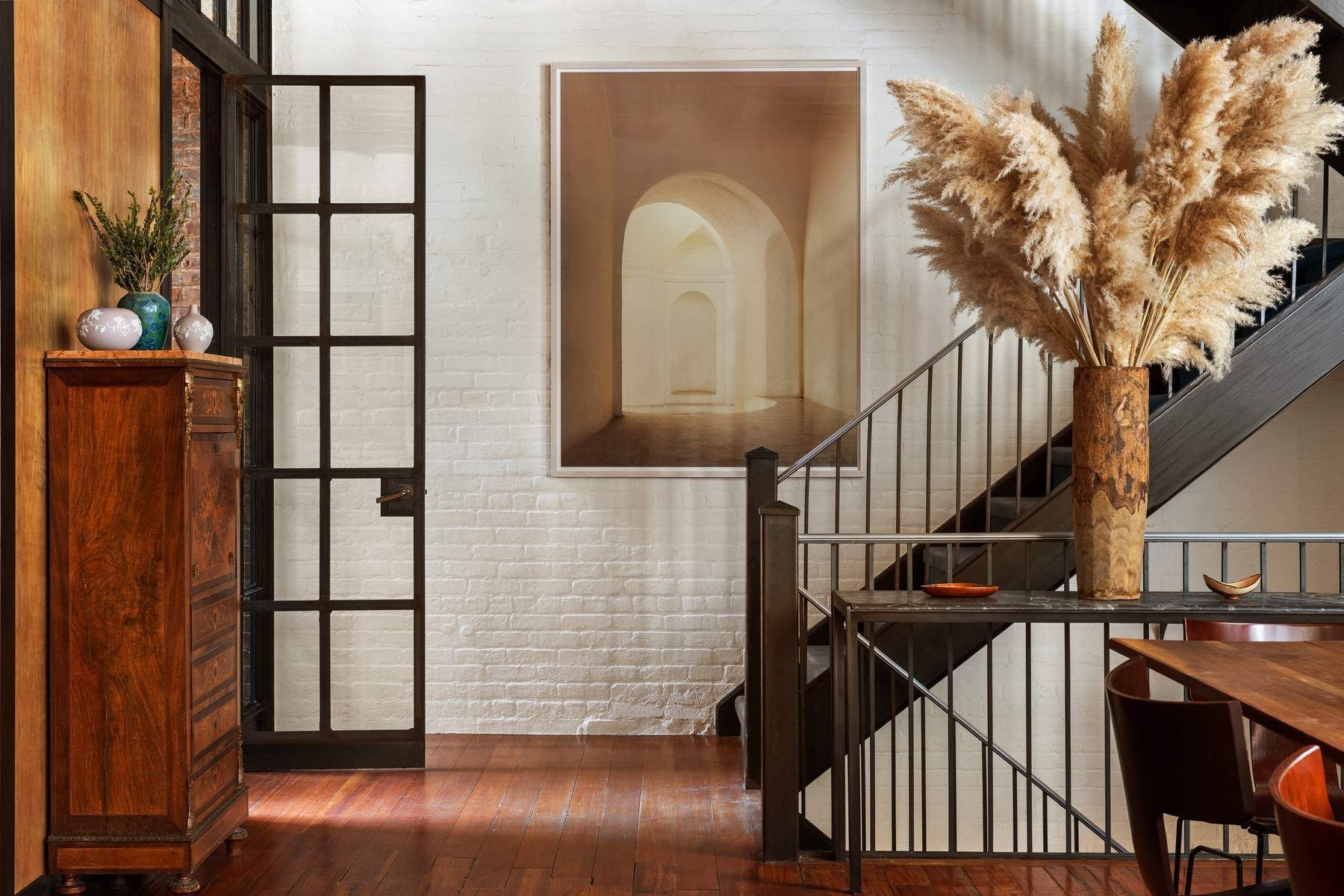 4 Staple Street Manhattan, NY 10013 - Photo 14 of 29 a view of staircase with wooden floor and window