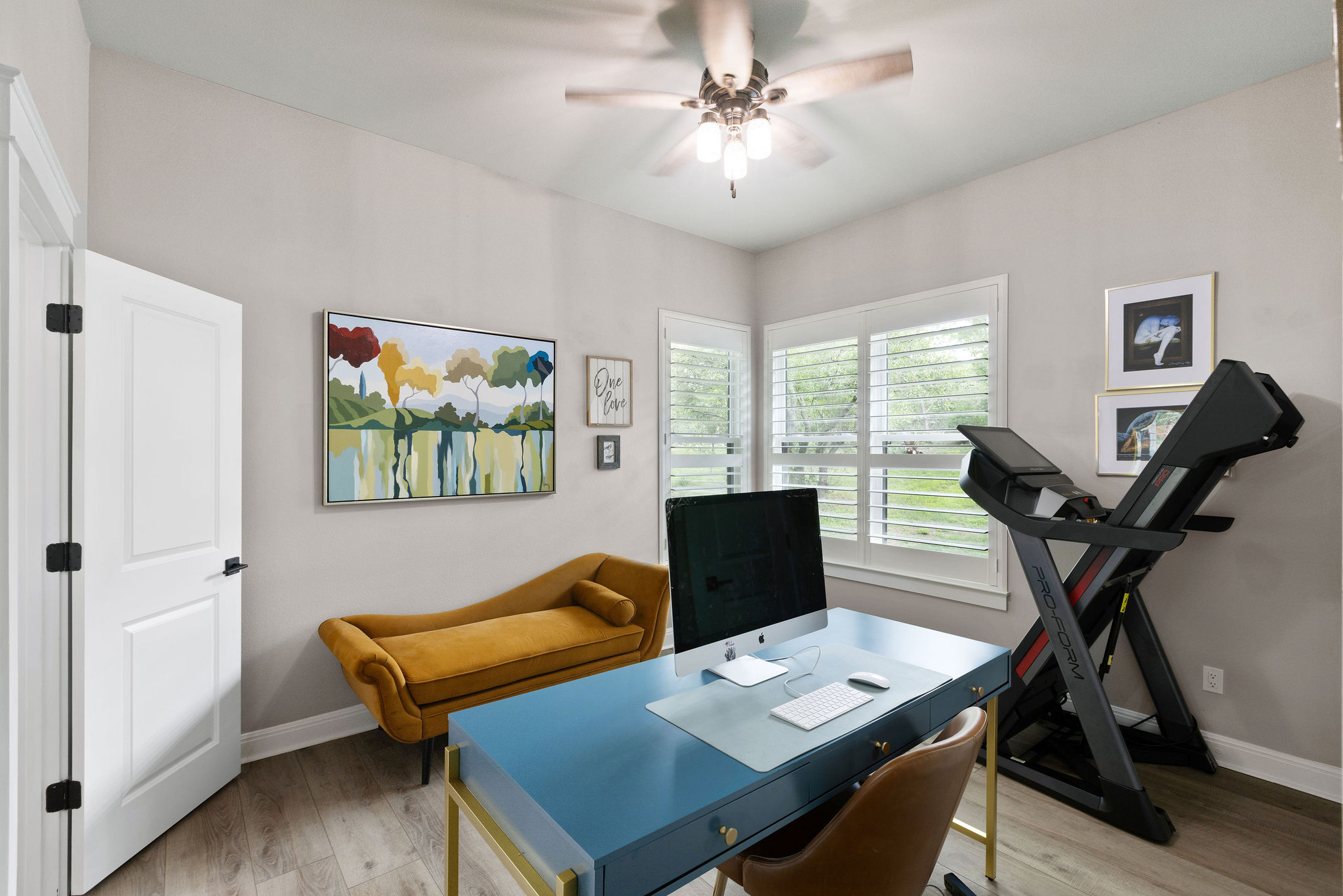 279 Rugged Earth Drive Austin, TX 78737 - Photo 31 of 40 Home office featuring a ceiling fan and light wood finished floors