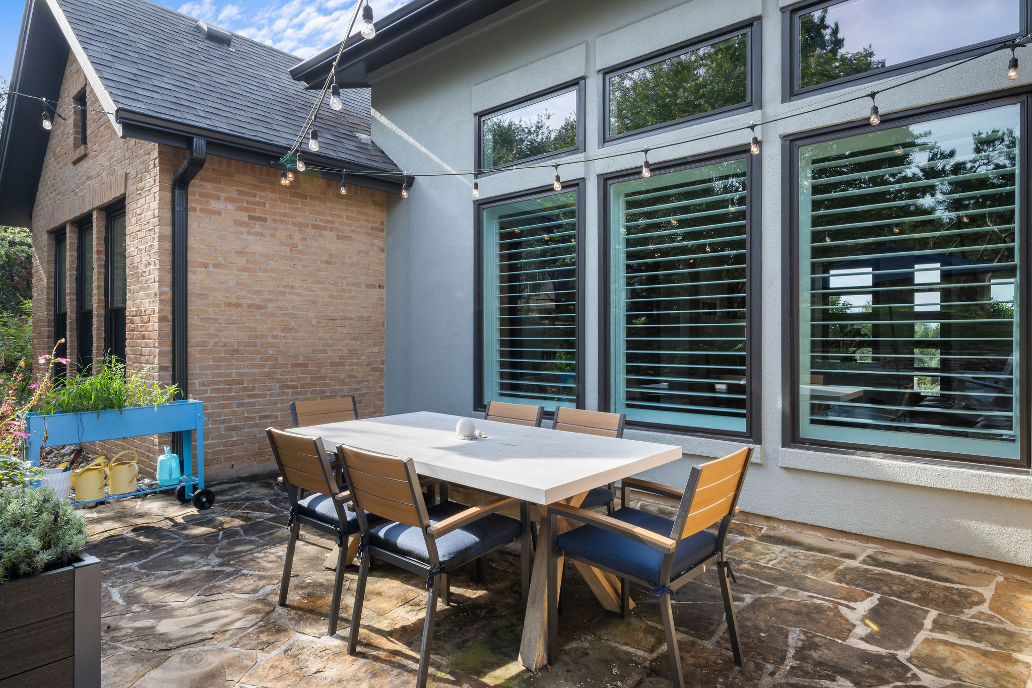 279 Rugged Earth Drive Austin, TX 78737 - Photo 36 of 40 View of patio with outdoor dining area
