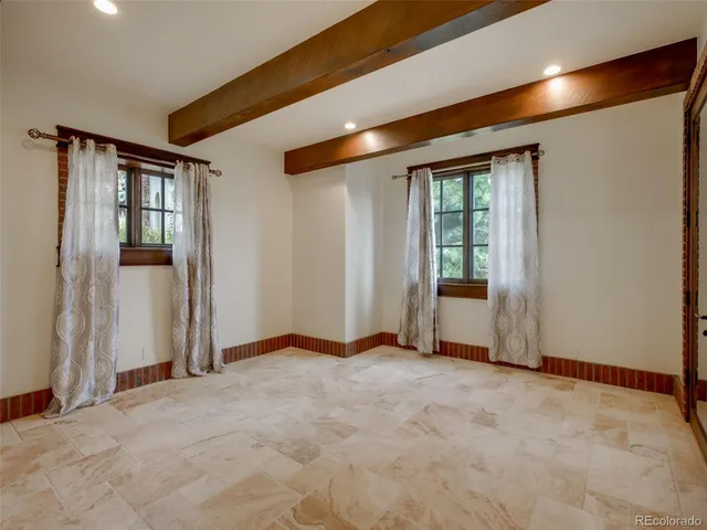 a bathroom with a toilet a sink and a shower