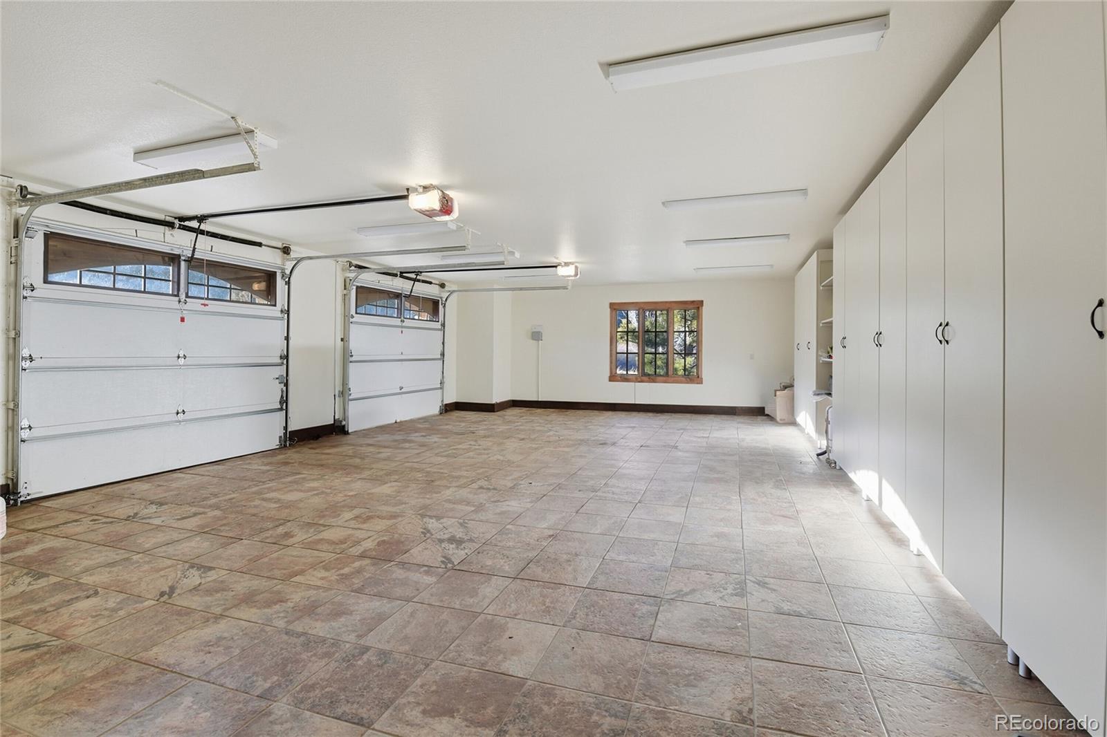 7188 Raphael Lane Littleton, CO 80125 - Photo 36 of 46 a view of a garage