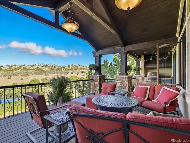 a front view of a house with garden and plants