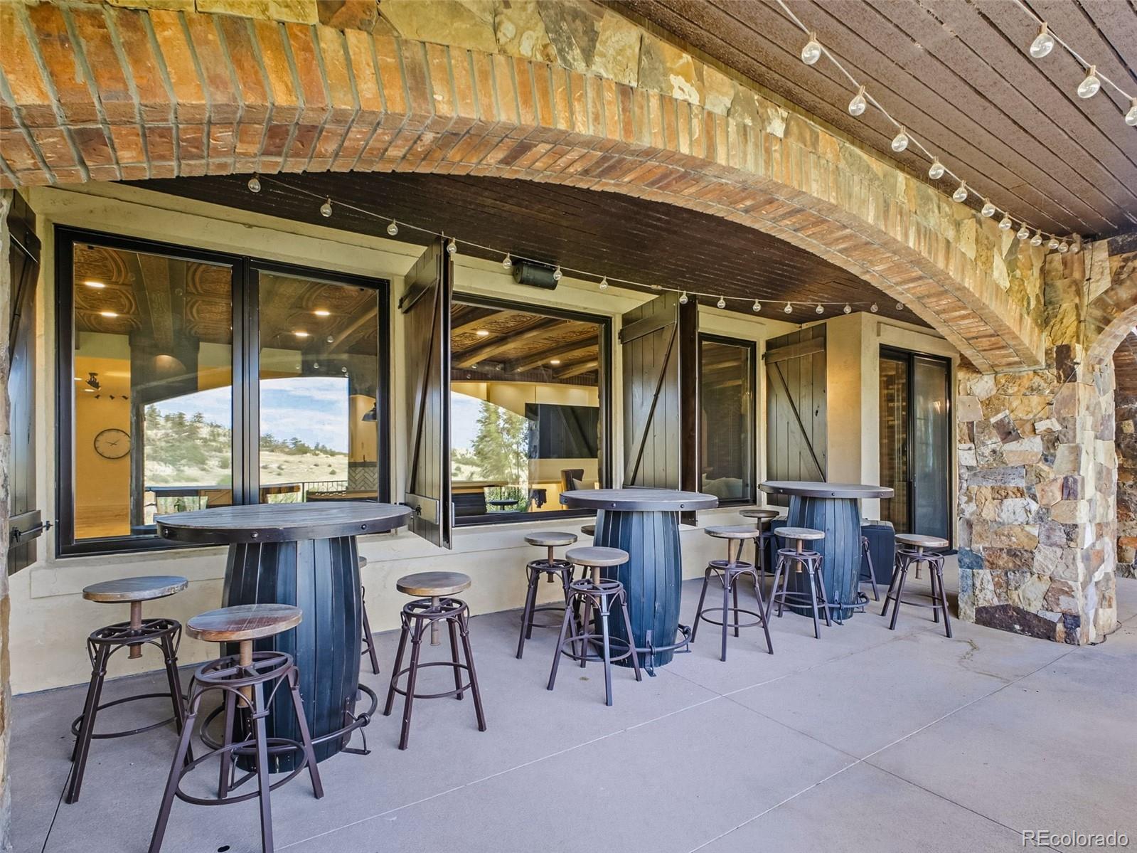 7188 Raphael Lane Littleton, CO 80125 - Photo 42 of 46 a view of dining area with table and chairs