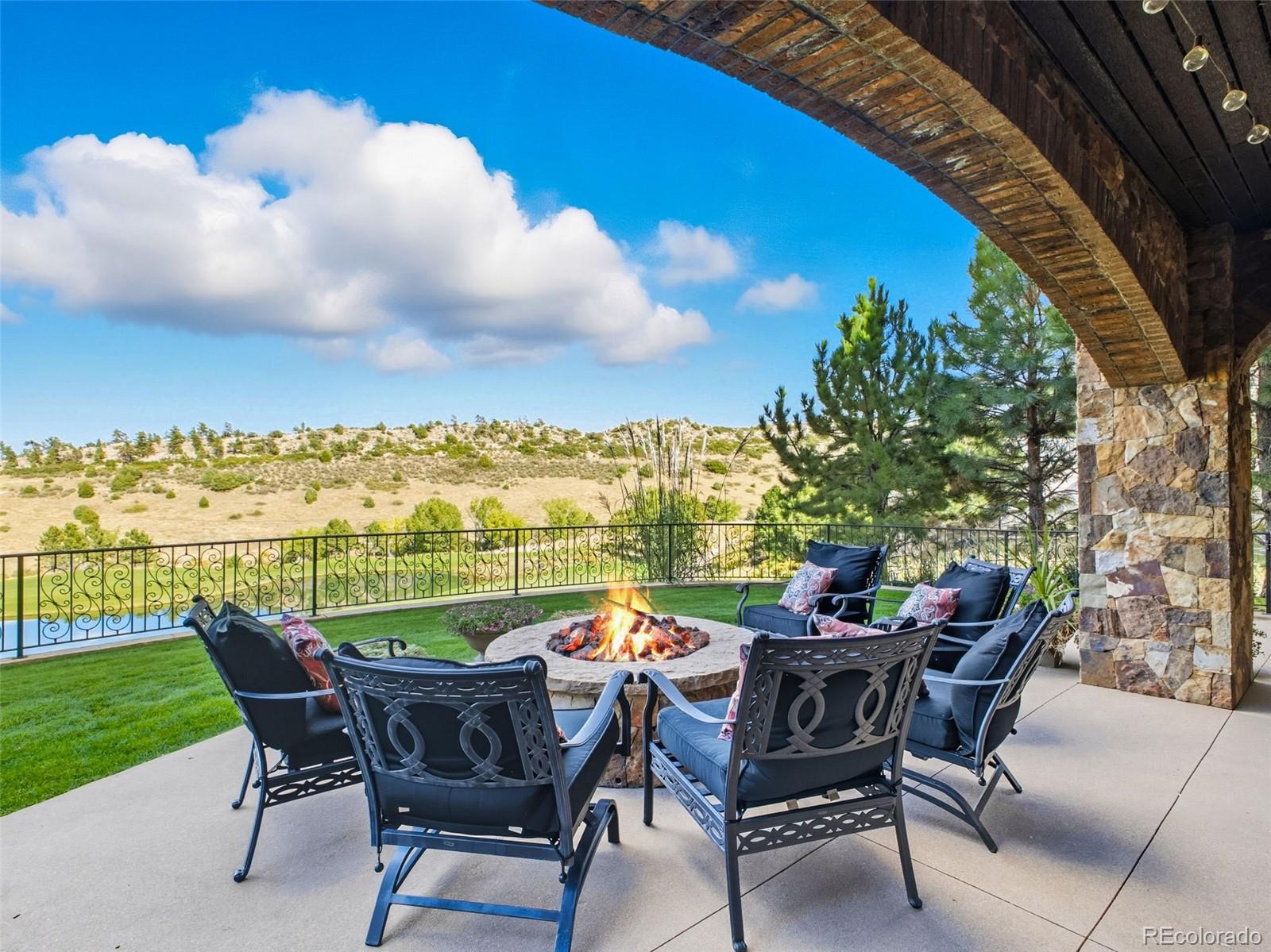 7188 Raphael Lane Littleton, CO 80125 - Photo 43 of 46 a view of a chairs and table in patio
