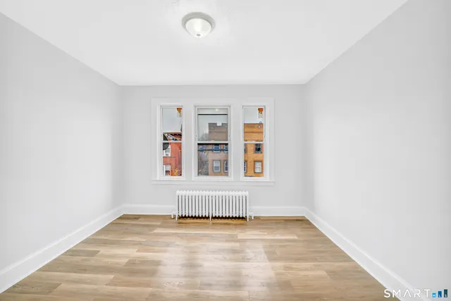 an empty room with windows