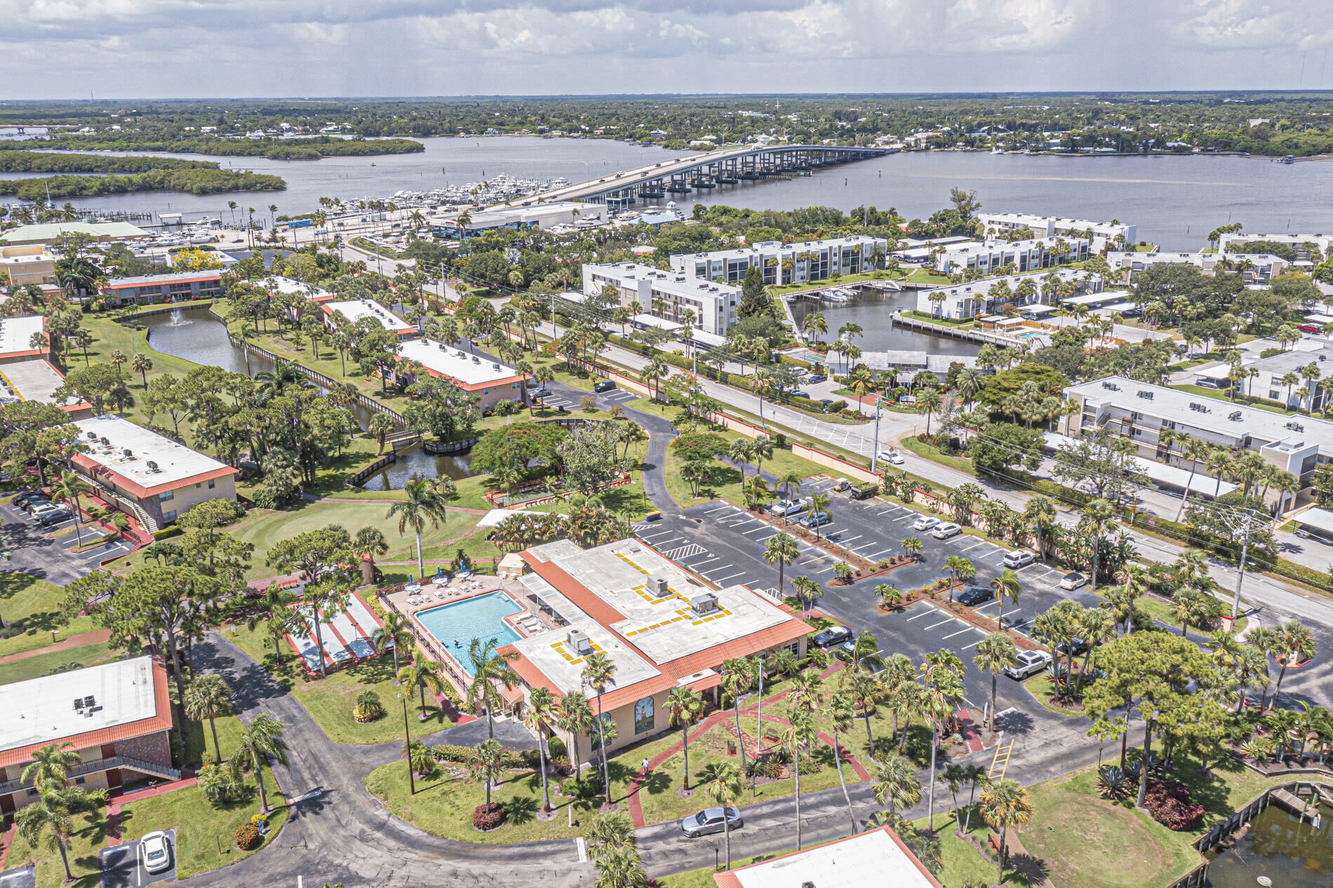 1987 Southwest Palm City Road, Unit BLDG 45 D Stuart, FL 34994 - Photo 31 of 49 an aerial view of residential houses with outdoor space