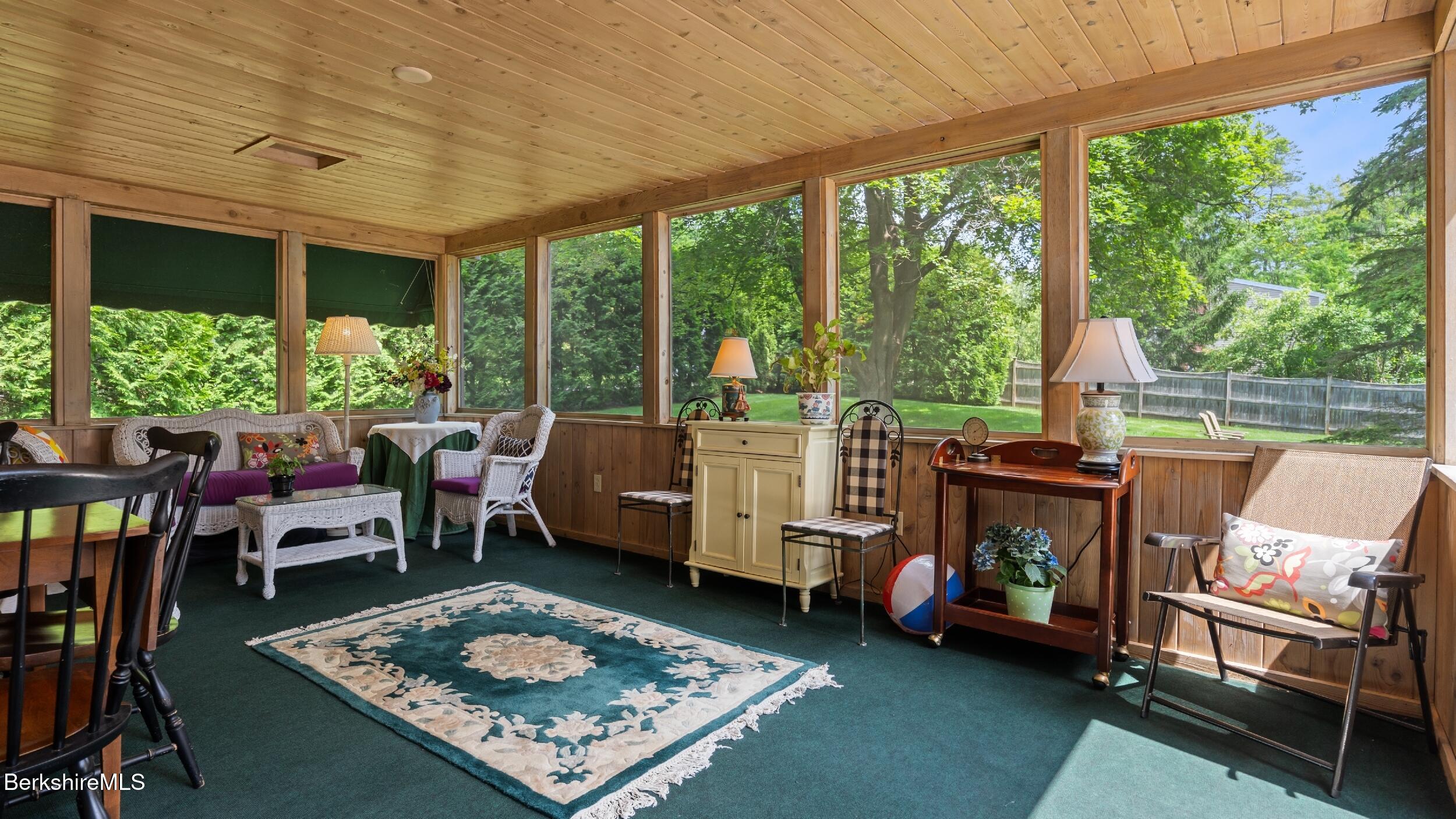 51 New Lenox Road Lenox, MA 01240 - Photo 12 of 38 a living room with furniture and a fireplace