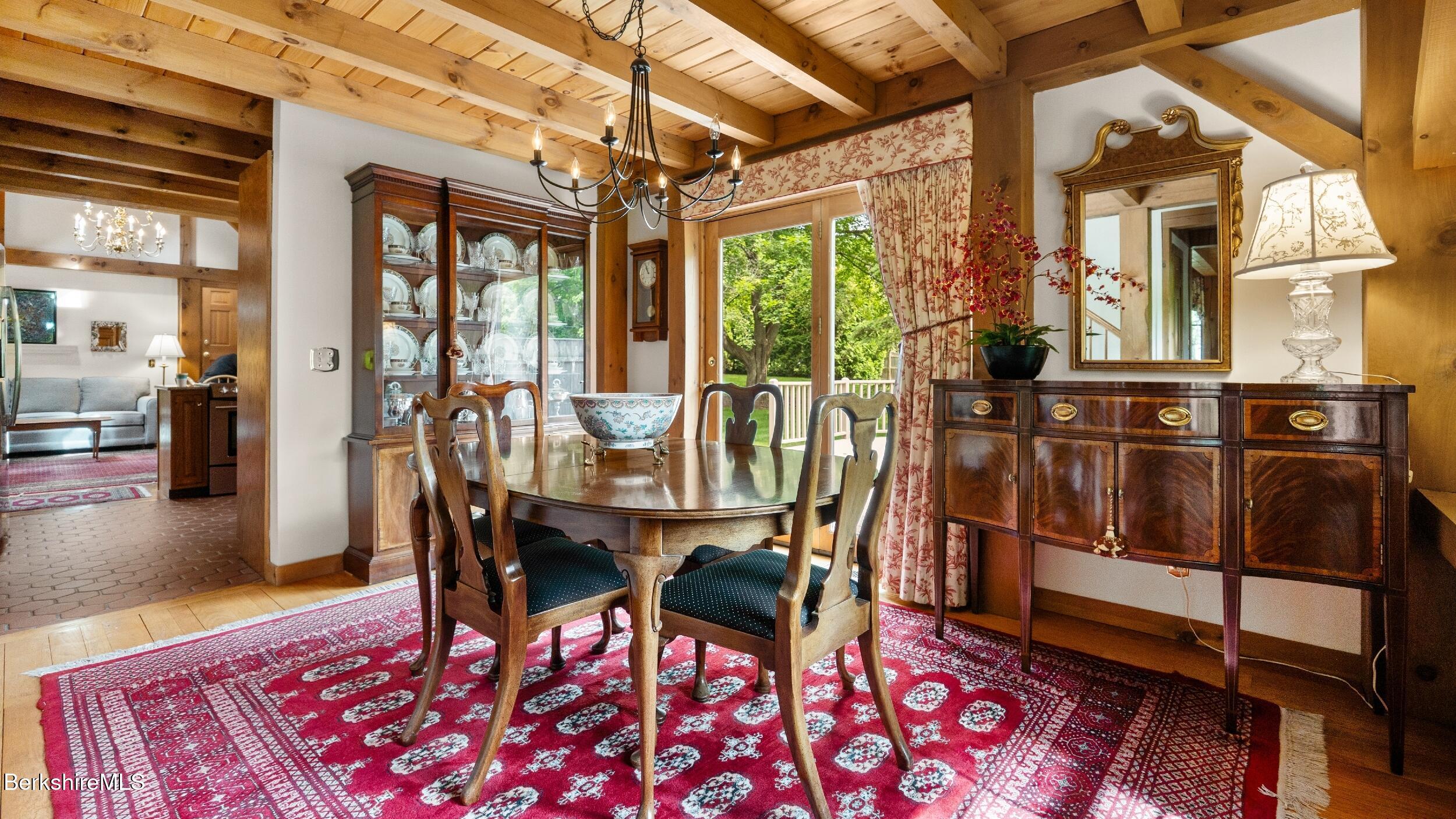 51 New Lenox Road Lenox, MA 01240 - Photo 16 of 38 a view of a dining room with furniture window and wooden floor