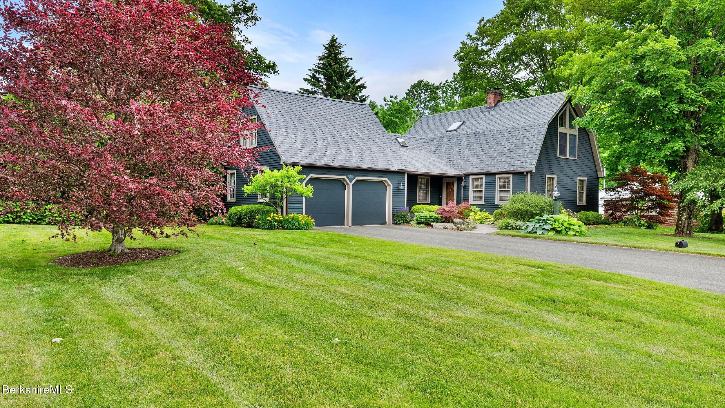 51 New Lenox Road Lenox, MA 01240 - Photo 2 of 38 a front view of house with yard and green space