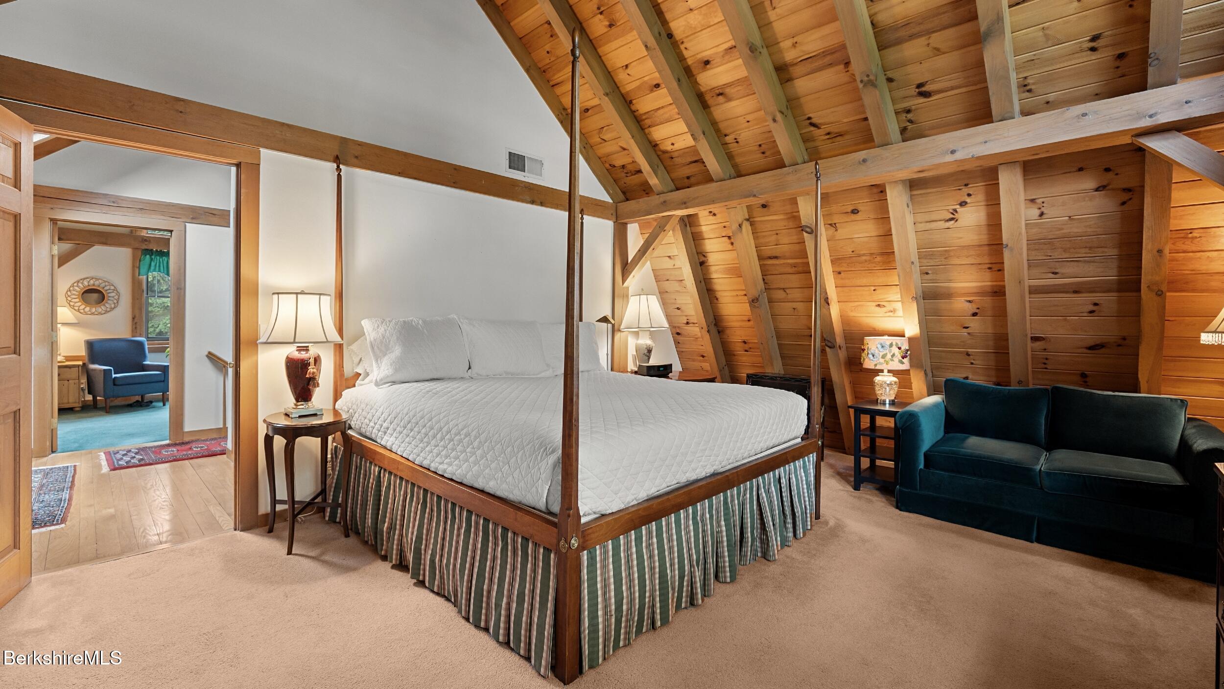 51 New Lenox Road Lenox, MA 01240 - Photo 24 of 38 a bedroom with furniture and a large window