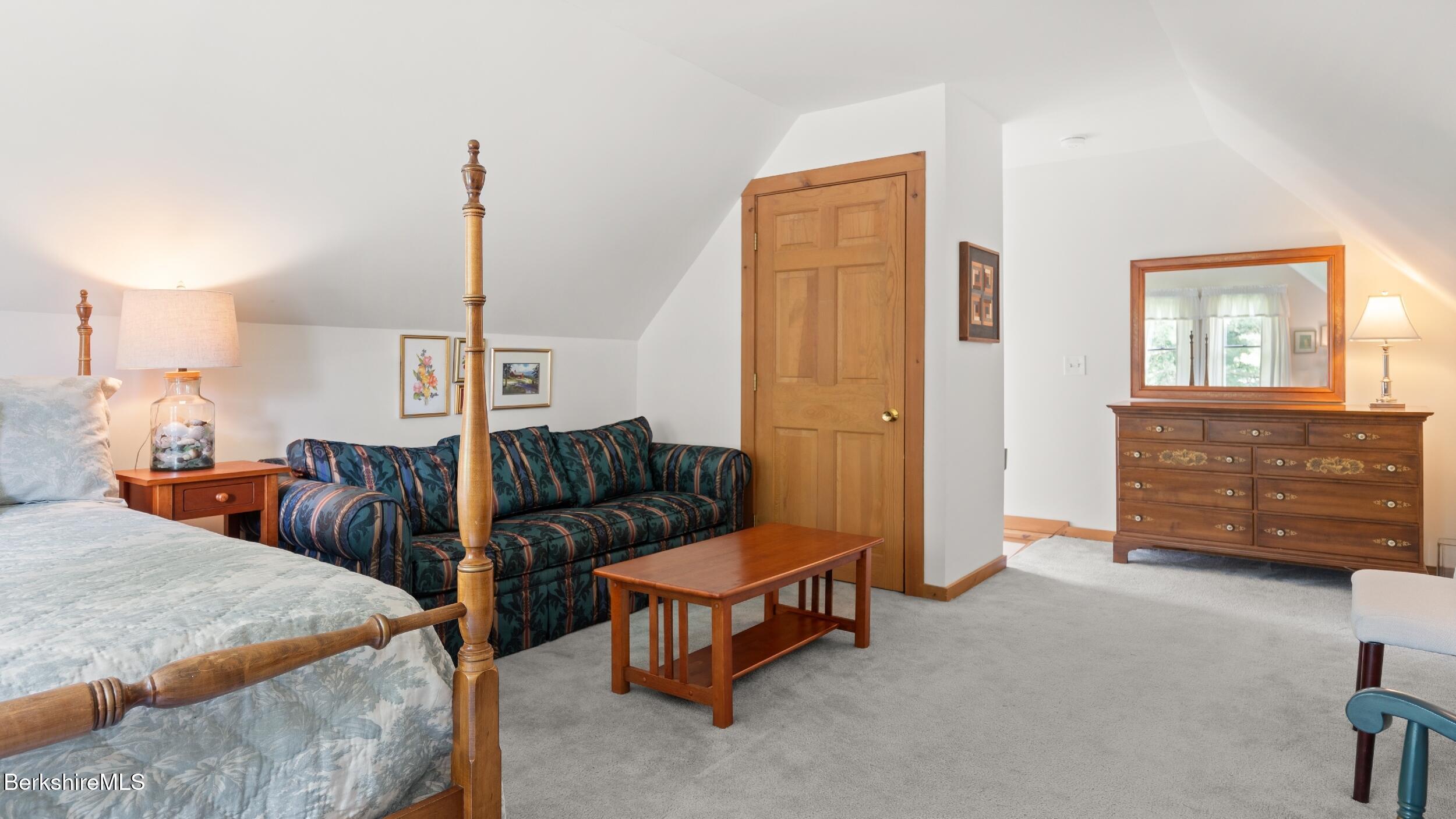 51 New Lenox Road Lenox, MA 01240 - Photo 26 of 38 a living room with furniture and a dresser