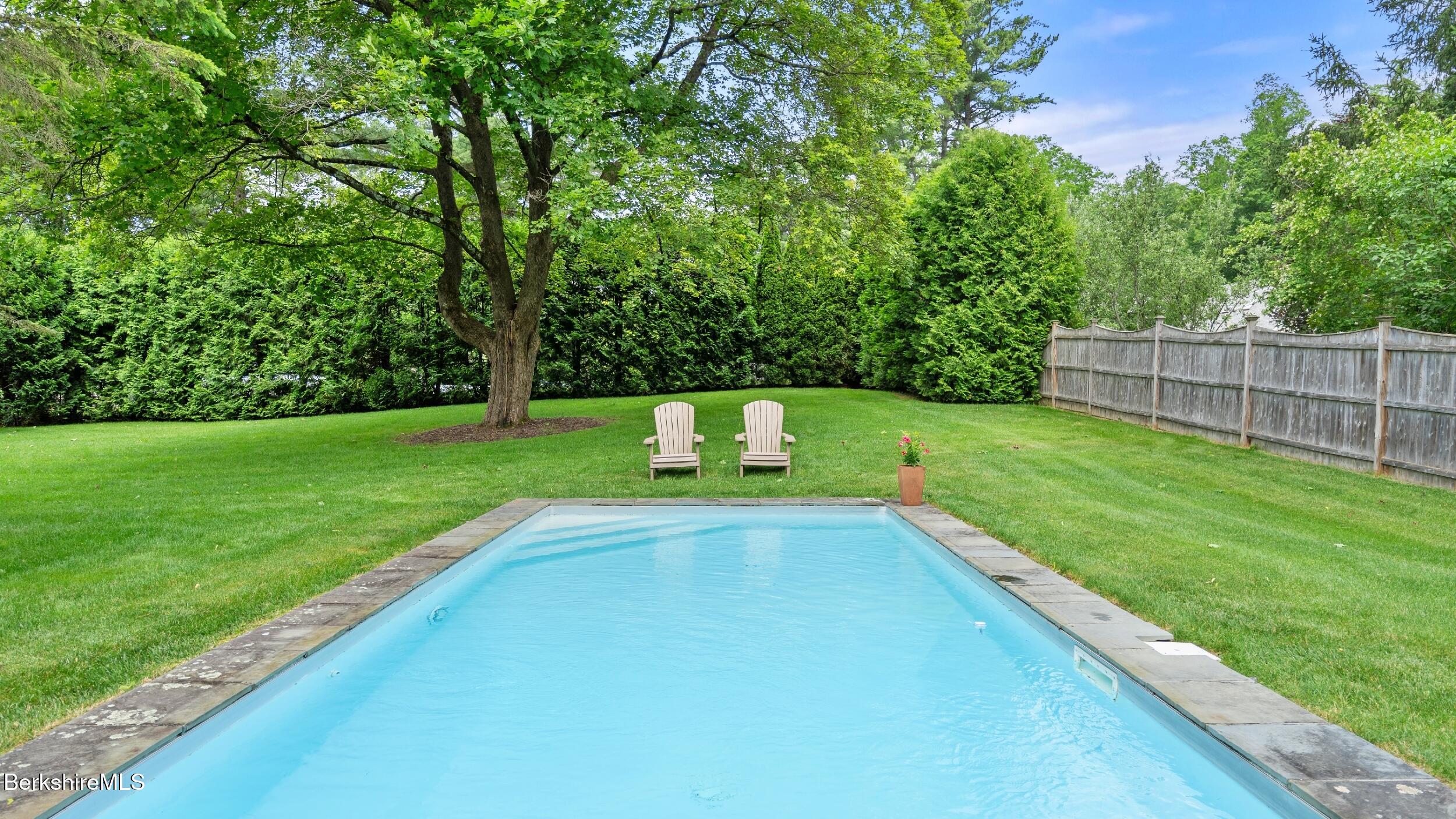 51 New Lenox Road Lenox, MA 01240 - Photo 31 of 38 a view of a backyard with a small park
