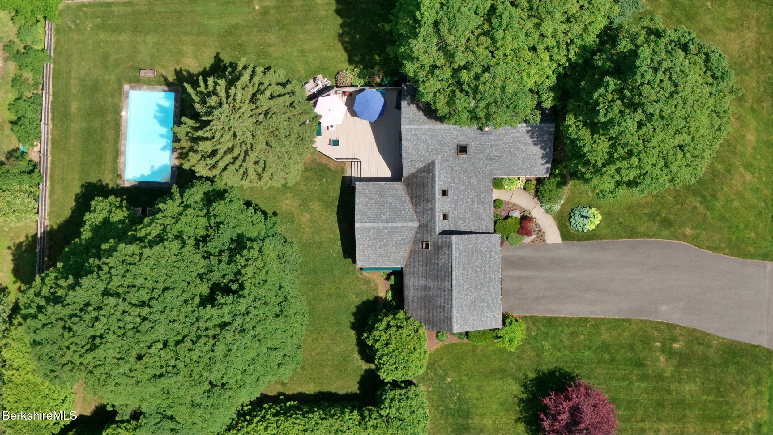 51 New Lenox Road Lenox, MA 01240 - Photo 4 of 38 an aerial view of a house with a yard basket ball court and outdoor seating