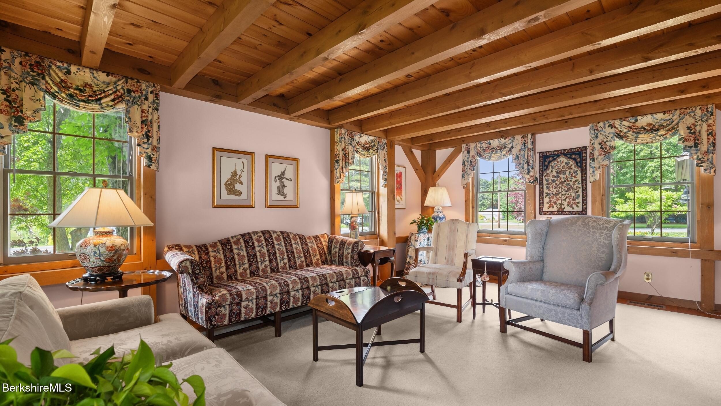 51 New Lenox Road Lenox, MA 01240 - Photo 6 of 38 a living room with furniture and a large window