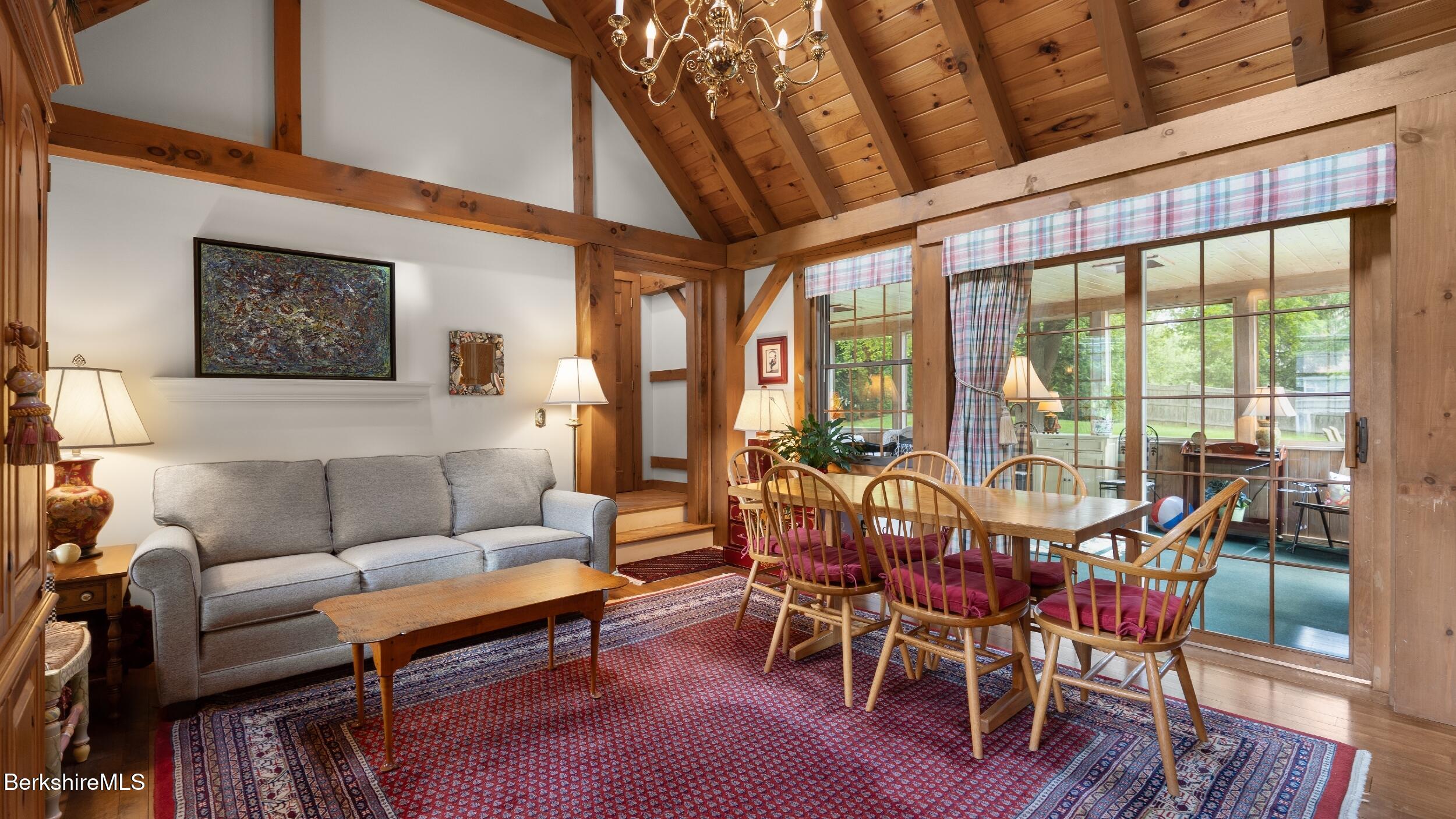 51 New Lenox Road Lenox, MA 01240 - Photo 10 of 38 a view of a dining room with furniture window and wooden floor