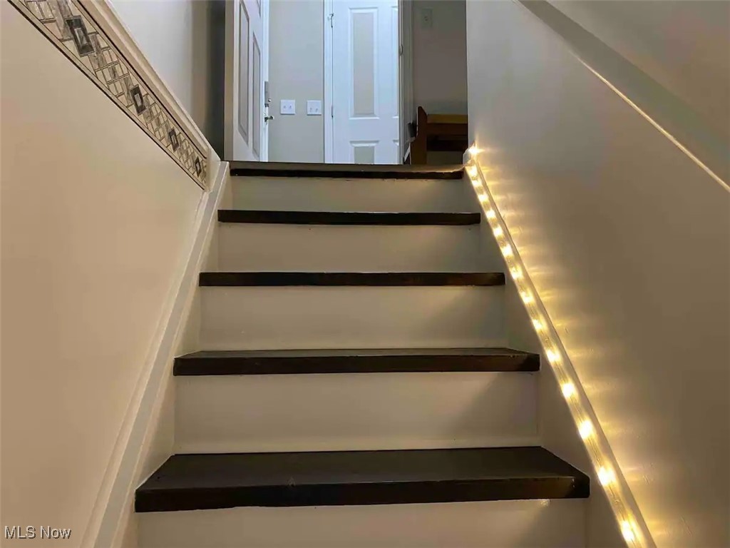 180 Elizabeth Parkway Akron, OH 44304 - Photo 9 of 46 View of stairs to lower level Guest Quarters fully finished in 2023