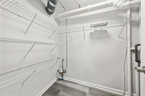 a view of a room with racks on the wall