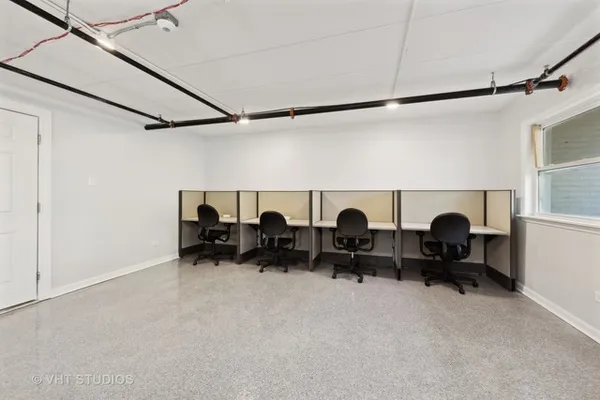 a couple of chairs sitting in a room