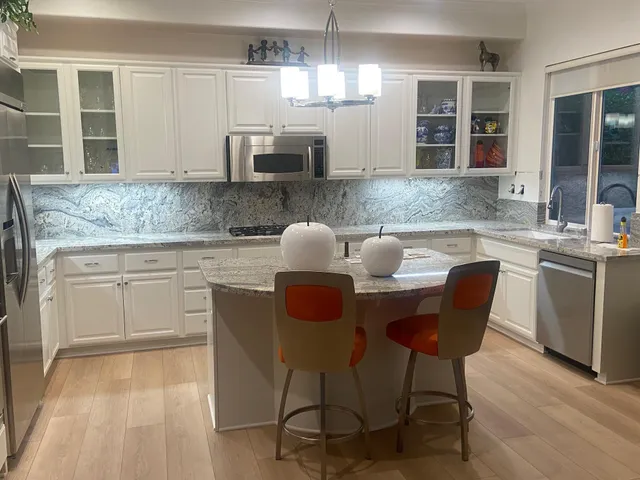 a reading room with furniture and a window