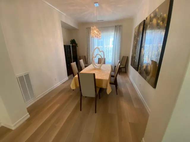 a bedroom with a bed and a television