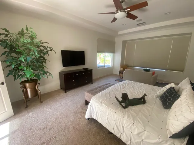 a bathroom with a toilet a sink and a shower