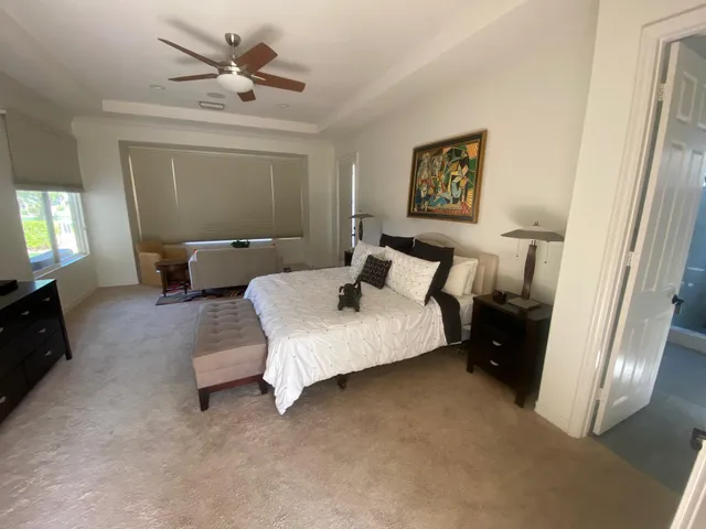 a bathroom with a tub and shower