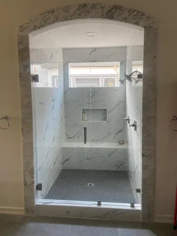 a view of a patio with table and chairs and potted plants