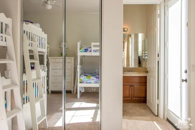a lobby with furniture and floor to ceiling window