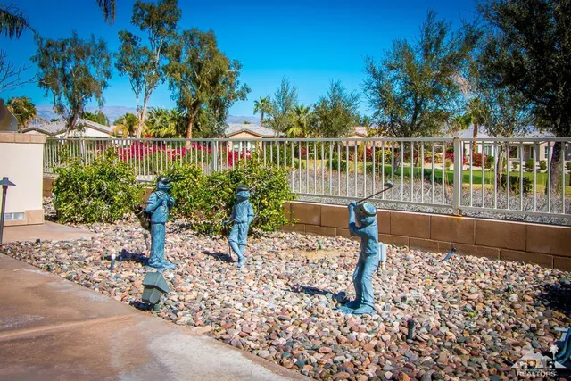 a view of a house with a small yard