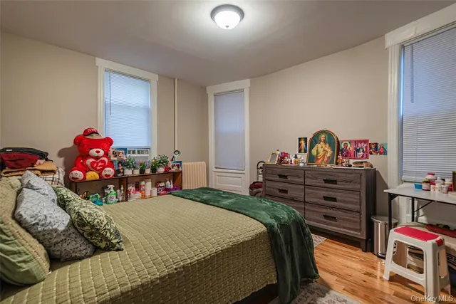 a bedroom with a bed and closet