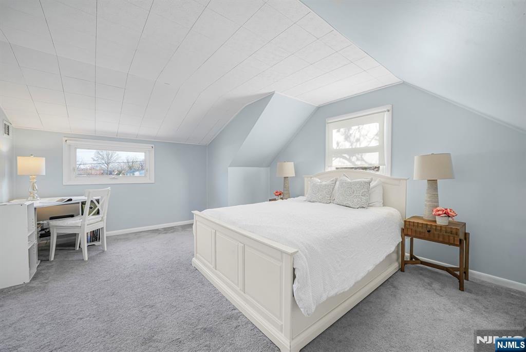 21 Joseph Place Wayne, NJ 07470 - Photo 17 of 32 a bedroom with a bed and a chair