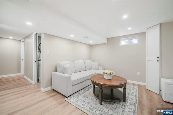 a living room with furniture and a table
