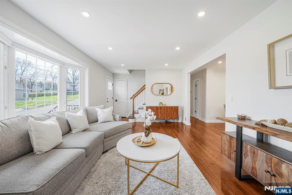 21 Joseph Place Wayne, NJ 07470 - Photo 5 of 32 a living room with furniture and a wooden floor