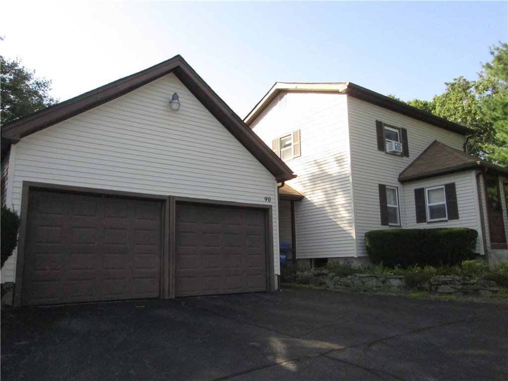 90 Scott Road Cumberland, RI 02864 - Photo 2 of 37 EXTERIOR FRONT WITH 2 CAR GARAGE ATTACHED