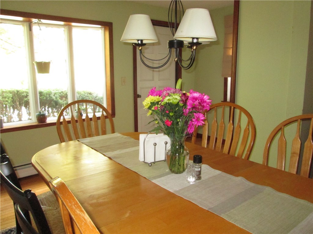 90 Scott Road Cumberland, RI 02864 - Photo 23 of 37 DINING AREA WITH VIEW TOWARD MAIN DOOR